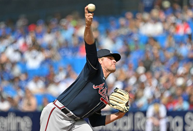 May 13, 2023; Toronto, Ontario, CAN; Atlanta Braves starting pitcher Bryce Elder (55) delivers a pitch against the Toronto Blue Jays in the first inning at Rogers Centre. Mandatory Credit: Dan Hamilton-USA TODAY Sports