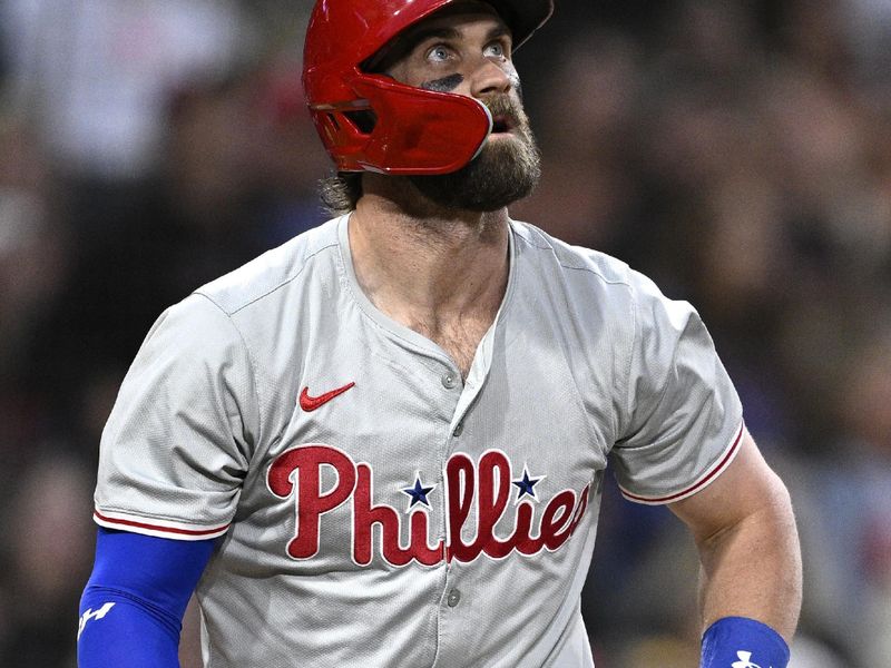 Apr 26, 2024; San Diego, California, USA; Philadelphia Phillies first baseman Bryce Harper (3) hits a home run against the San Diego Padres during the third inning at Petco Park. Mandatory Credit: Orlando Ramirez-USA TODAY Sports