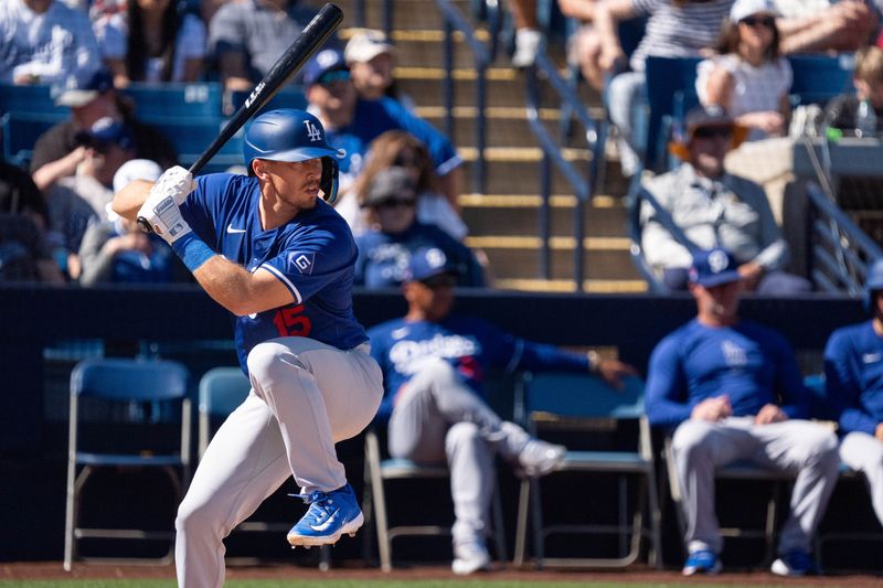 Mar 2, 2024; Phoenix, Arizona, USA; Los Angeles Dodgers catcher Austin Barnes (15) at bat in the third during a spring training game against the Milwaukee Brewers at American Family Fields of Phoenix. Mandatory Credit: Allan Henry-USA TODAY Sports