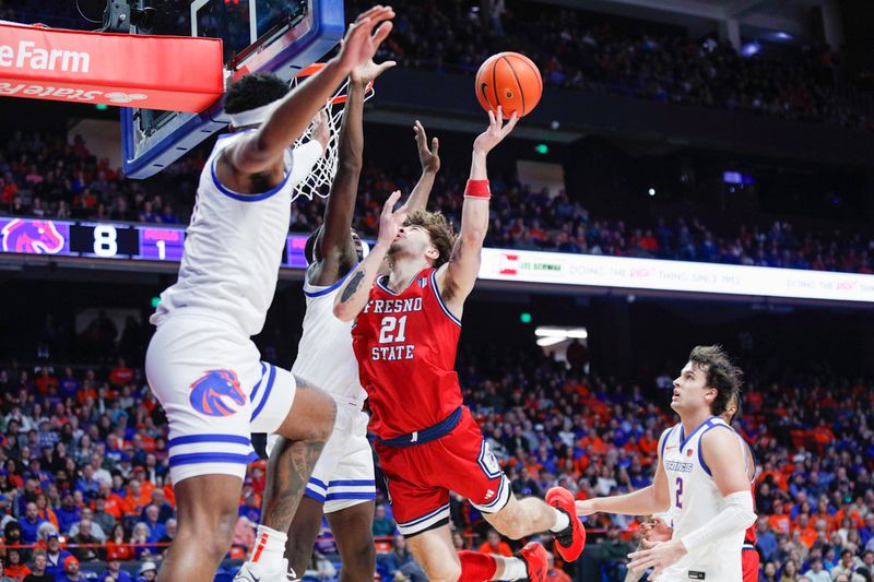 Feb 17, 2024; Boise, Idaho, USA; Fresno State Bulldogs guard Isaiah Pope (21) drives during the first half against the Boise State Broncos at ExtraMile Arena. Mandatory Credit: Brian Losness-USA TODAY Sports
