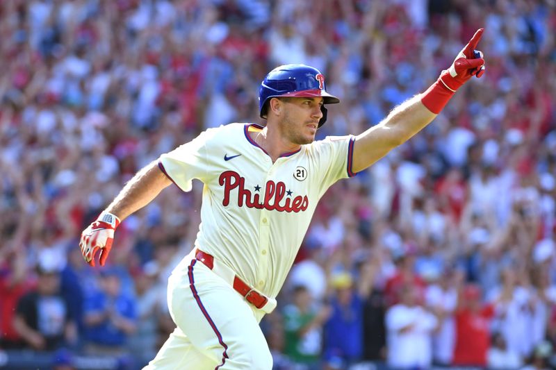 Sep 15, 2024; Philadelphia, Pennsylvania, Philadelphia Phillies catcher J.T. Realmuto (10) celebrates his walk-off RBI single during the ninth inning against the New York Mets USA; at Citizens Bank Park. Mandatory Credit: Eric Hartline-Imagn Images