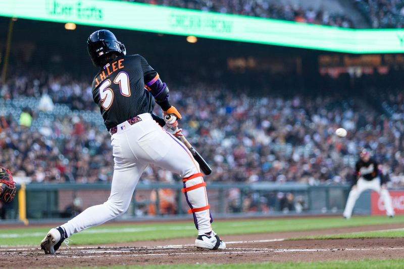 May 13, 2025; San Francisco, California, USA; San Francisco Giants center fielder Jung Hoo Lee (51) hits a single against the Arizona Diamondbacks during the third inning at Oracle Park. Mandatory Credit: John Hefti-Imagn Images