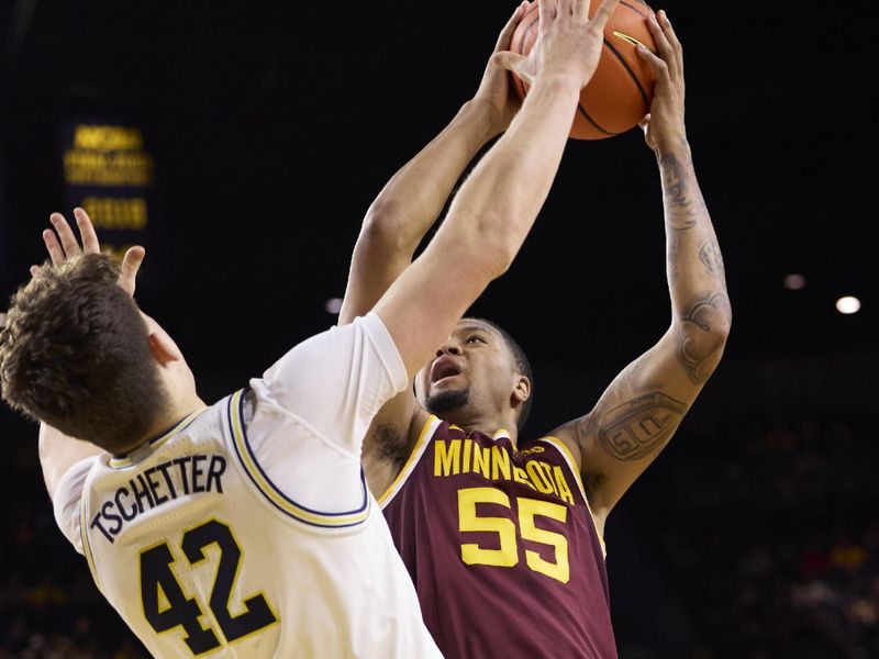 Jan 22, 2023; Ann Arbor, Michigan, USA; Minnesota Golden Gophers guard Ta'lon Cooper (55) shoots on Michigan Wolverines forward Will Tschetter (42) in the second half at Crisler Center. Mandatory Credit: Rick Osentoski-USA TODAY Sports