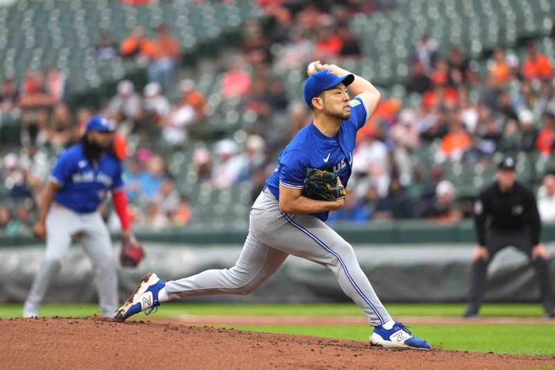 May 15, 2024; Baltimore, Maryland, USA; Toronto Blue Jays pitcher Yusei Kikuchi (39) delivers in the first inning against the Baltimore Orioles at Oriole Park at Camden Yards. Mandatory Credit: Mitch Stringer-USA TODAY Sports