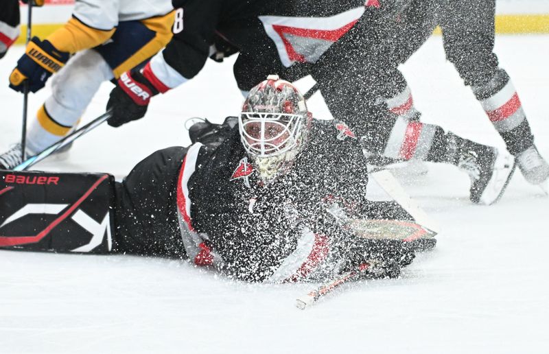 Jan 31, 2025; Buffalo, New York, USA; Buffalo Sabres goaltender Ukko-Pekka Luukkonen (1) blocks a shot in the third period against the Nashville Predators at the KeyBank Center. Mandatory Credit: Mark Konezny-Imagn Images