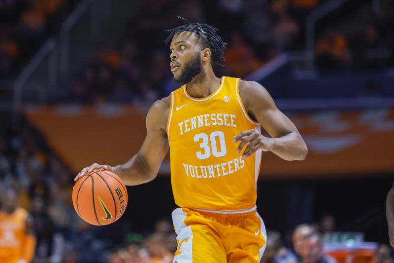 Dec 4, 2022; Knoxville, Tennessee, USA; Tennessee Volunteers guard Josiah-Jordan James (30) brings the ball up court against the Alcorn State Braves at Thompson-Boling Arena. Mandatory Credit: Randy Sartin-USA TODAY Sports