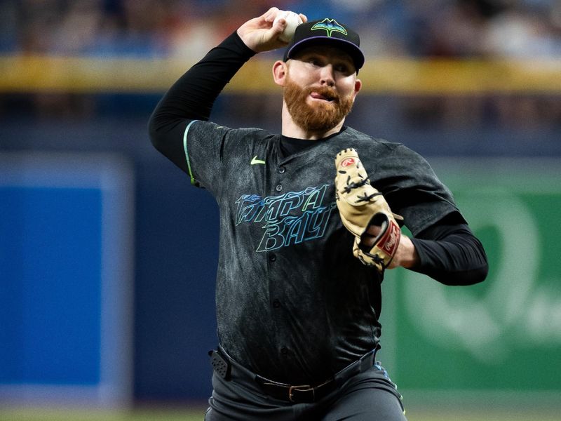 Jul 27, 2024; St. Petersburg, Florida, USA; Tampa Bay Rays pitcher Zack Littell (52) pitches the ball against the Cincinnati Reds during the first inning at Tropicana Field. Mandatory Credit: Matt Pendleton-USA TODAY Sports