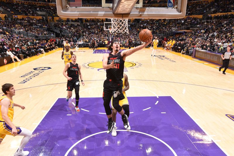 LOS ANGELES, CA - JANUARY 3: Jaime Jaquez Jr. #11 of the Miami Heat shoots the ball during the game against the Los Angeles Lakers on January 3, 2024 at Crypto.Com Arena in Los Angeles, California. NOTE TO USER: User expressly acknowledges and agrees that, by downloading and/or using this Photograph, user is consenting to the terms and conditions of the Getty Images License Agreement. Mandatory Copyright Notice: Copyright 2024 NBAE (Photo by Adam Pantozzi/NBAE via Getty Images)