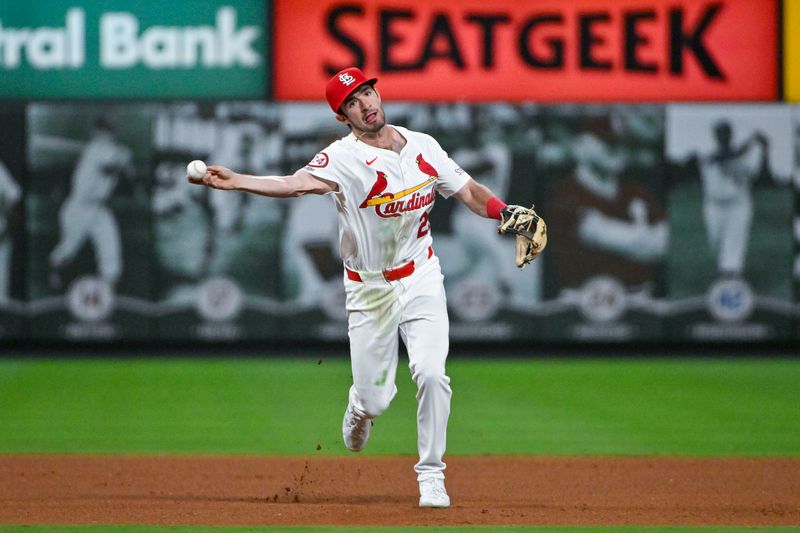 Sep 10, 2024; St. Louis, Missouri, USA;  St. Louis Cardinals shortstop Thomas Saggese (25) fields a ground ball in his Major League debut during the seventh inning against the Cincinnati Reds at Busch Stadium. Mandatory Credit: Jeff Curry-Imagn Images