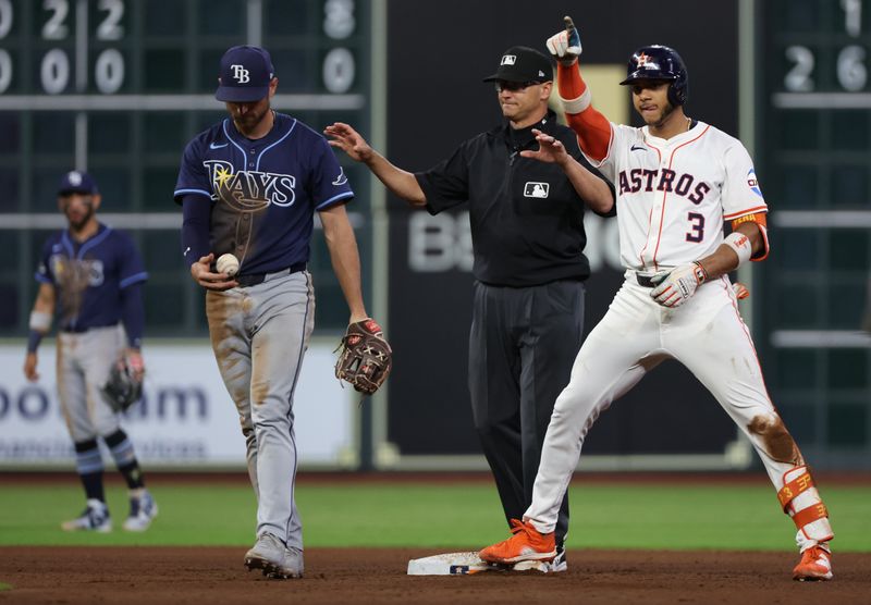 May 29, 2025; Houston, Texas, USA; Houston Astros shortstop Jeremy Pena (3) reacts to his double against the Tampa Bay Rays in the fourth inning at Daikin Park. Mandatory Credit: Thomas Shea-Imagn Images