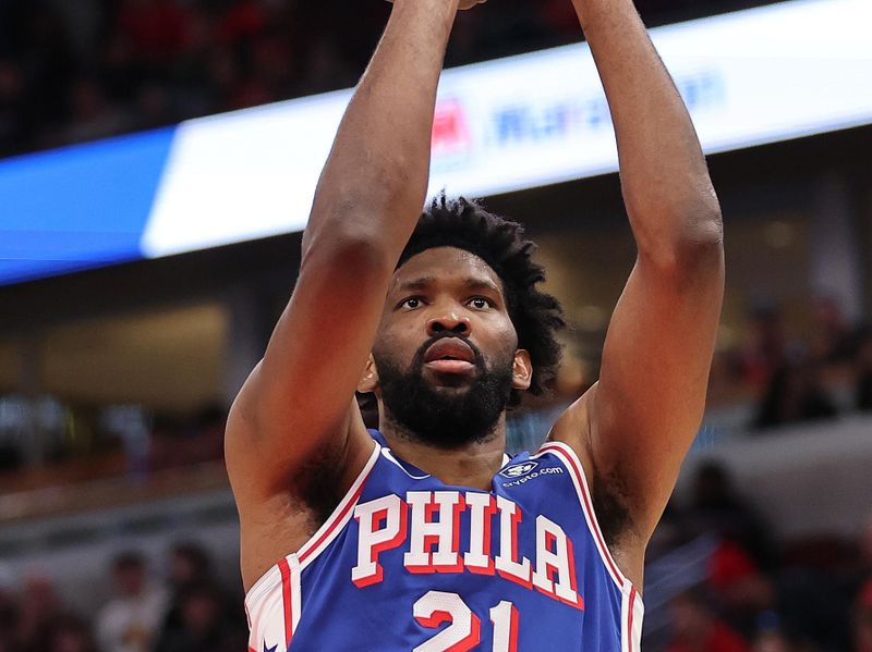 CHICAGO, ILLINOIS - DECEMBER 08: Joel Embiid #21 of the Philadelphia 76ers shoots against the Chicago Bulls during the first half at the United Center on December 08, 2024 in Chicago, Illinois. NOTE TO USER: User expressly acknowledges and agrees that, by downloading and or using this photograph, User is consenting to the terms and conditions of the Getty Images License Agreement.  (Photo by Michael Reaves/Getty Images)