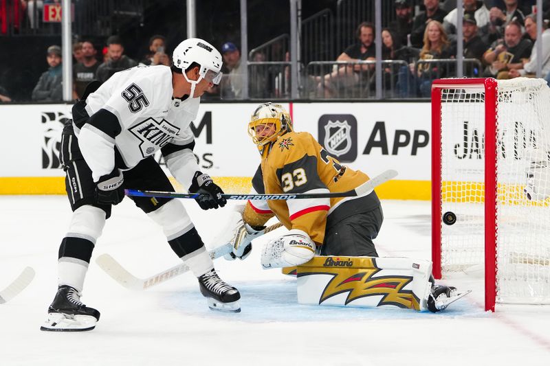 Oct 8, 2025; Las Vegas, Nevada, USA; Los Angeles Kings right wing Quinton Byfield (55) scores a goal against Vegas Golden Knights goaltender Adin Hill (33) during the first period at T-Mobile Arena. Mandatory Credit: Stephen R. Sylvanie-Imagn Images