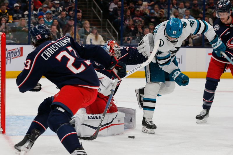 Mar 16, 2024; Columbus, Ohio, USA; Columbus Blue Jackets goalie Daniil Tarasov (40) makes a save on the shot of San Jose Sharks center Ryan Carpenter (22) during the first period at Nationwide Arena. Mandatory Credit: Russell LaBounty-USA TODAY Sports