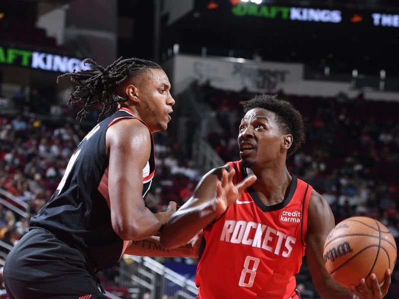 HOUSTON, TX - MARCH 25: Jae'Sean Tate #8 of the Houston Rockets handles the ball during the game against the Portland Trail Blazers on March 25, 2024 at the Toyota Center in Houston, Texas. NOTE TO USER: User expressly acknowledges and agrees that, by downloading and or using this photograph, User is consenting to the terms and conditions of the Getty Images License Agreement. Mandatory Copyright Notice: Copyright 2024 NBAE (Photo by Logan Riely/NBAE via Getty Images)