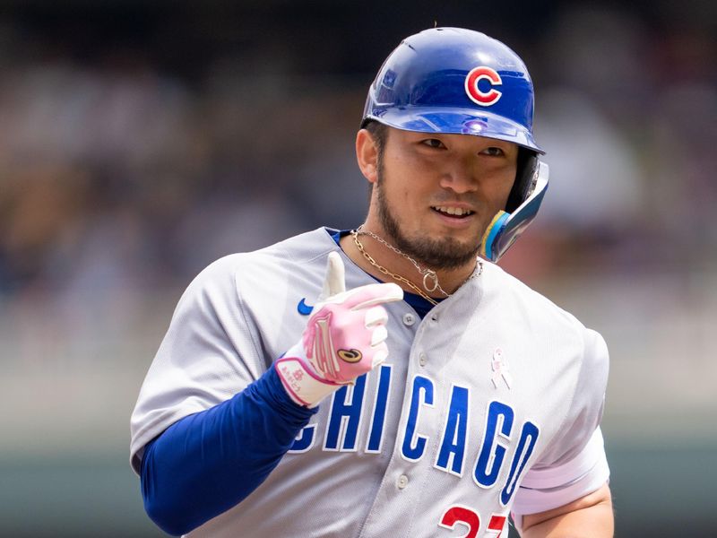 May 14, 2023; Minneapolis, Minnesota, USA; Chicago Cubs right fielder Seiya Suzuki (27) rounds third base after hitting a home run off Minnesota Twins starting pitcher Louie Varland (not pictured) in the seventh inning at Target Field. Mandatory Credit: Matt Blewett-USA TODAY Sports