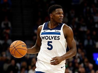 MINNEAPOLIS, MINNESOTA - NOVEMBER 01: Anthony Edwards #5 of the Minnesota Timberwolves dribbles the ball against the Denver Nuggets in the first quarter at Target Center on November 01, 2023 in Minneapolis, Minnesota. The Timberwolves defeated the Nuggets 110-89. NOTE TO USER: User expressly acknowledges and agrees that, by downloading and or using this photograph, User is consenting to the terms and conditions of the Getty Images License Agreement. (Photo by David Berding/Getty Images)