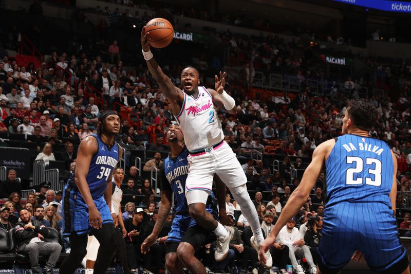 MIAMI, FL - JANUARY 27: Terry Rozier #2 of the Miami Heat drives to the basket during the game against the Orlando Magic on January 27, 2025 at Kaseya Center in Miami, Florida. NOTE TO USER: User expressly acknowledges and agrees that, by downloading and or using this Photograph, user is consenting to the terms and conditions of the Getty Images License Agreement. Mandatory Copyright Notice: Copyright 2025 NBAE (Photo by Issac Baldizon/NBAE via Getty Images)