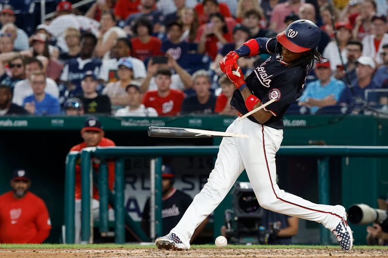 May 24, 2024; Washington, District of Columbia, USA; Washington Nationals shortstop CJ Abrams (5) shatters his bat while hitting a single against the Seattle Mariners during the seventh inning at Nationals Park. Mandatory Credit: Geoff Burke-USA TODAY Sports