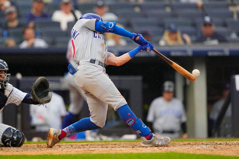 Jul 8, 2023; Bronx, New York, USA; Chicago Cubs third baseman Miles Mastrobuoni (20) hits a single against the New York Yankees during the eighth inning at Yankee Stadium. Mandatory Credit: Gregory Fisher-USA TODAY Sports