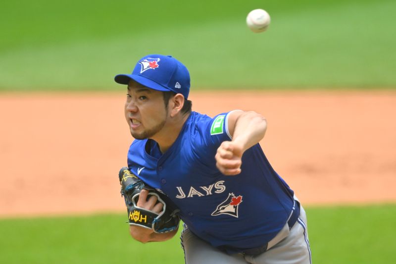 Jun 23, 2024; Cleveland, Ohio, USA; Toronto Blue Jays starting pitcher Yusei Kikuchi (16) delivers a pitch in the first inning against the Cleveland Guardians at Progressive Field. Mandatory Credit: David Richard-USA TODAY Sports