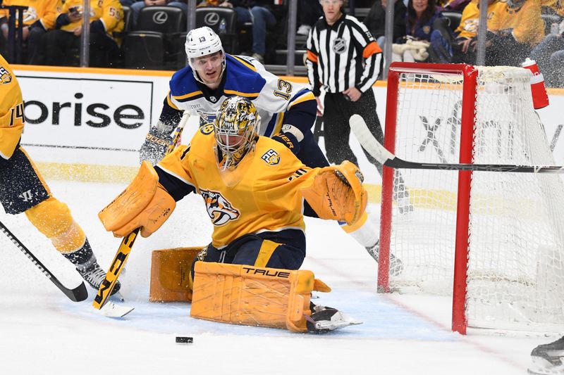 Apr 4, 2024; Nashville, Tennessee, USA; Nashville Predators goaltender Juuse Saros (74) makes a save during the second period against the St. Louis Blues at Bridgestone Arena. Mandatory Credit: Christopher Hanewinckel-USA TODAY Sports