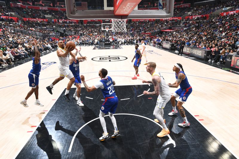 LOS ANGELES, CA - APRIL 12: Talen Horton-Tucker #5 of the Utah Jazz drives to the basket during the game against the LA Clippers on April 12, 2024 at Crypto.Com Arena in Los Angeles, California. NOTE TO USER: User expressly acknowledges and agrees that, by downloading and/or using this Photograph, user is consenting to the terms and conditions of the Getty Images License Agreement. Mandatory Copyright Notice: Copyright 2024 NBAE (Photo by Adam Pantozzi/NBAE via Getty Images)