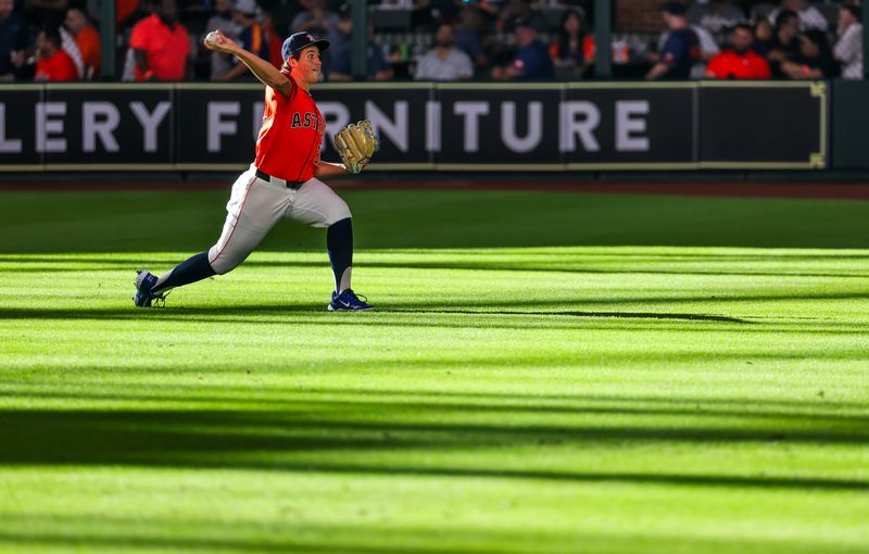 Jun 21, 2024; Houston, Texas, USA; Houston Astros starting pitcher Jake Bloss (39) warms up before pitching against the Baltimore Orioles at Minute Maid Park. This is Bloss major league debut. Mandatory Credit: Thomas Shea-USA TODAY Sports