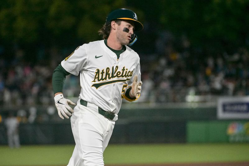 Apr 25, 2025; West Sacramento, California, USA; Athletics shortstop Jacob Wilson (5) rounds the bases after hitting a home run during the fifth inning against the Chicago White Sox at Sutter Health Park. Mandatory Credit: Ed Szczepanski-Imagn Images
