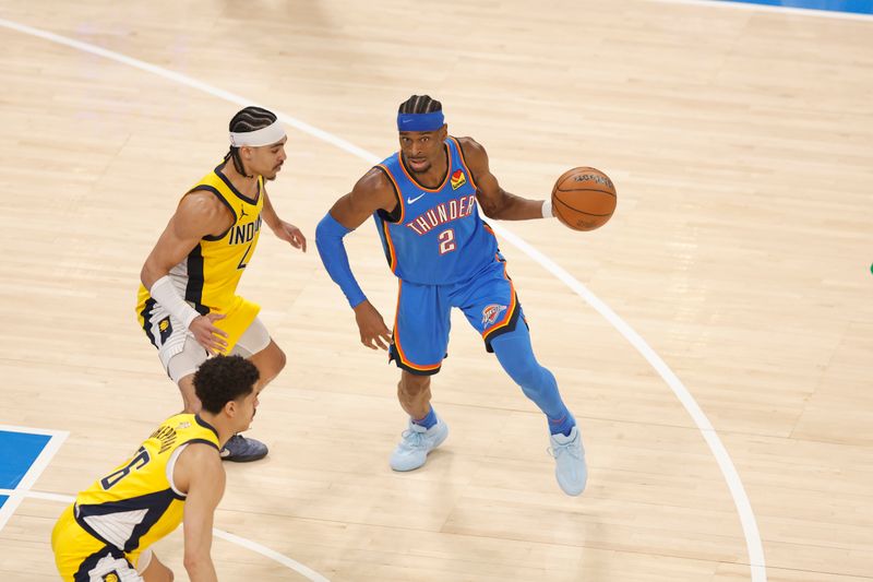 OKLAHOMA CITY, OK - JUNE 8: Shai Gilgeous-Alexander #2 of the Oklahoma City Thunder dribbles the ball during the game against the Indiana Pacers during Game Two of the 2025 NBA Finals on June 8, 2025 at Paycom Center in Oklahoma City, Oklahoma. NOTE TO USER: User expressly acknowledges and agrees that, by downloading and or using this photograph, User is consenting to the terms and conditions of the Getty Images License Agreement. Mandatory Copyright Notice: Copyright 2025 NBAE (Photo by Logan Riely /NBAE via Getty Images)