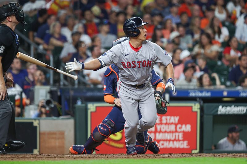 Aug 19, 2024; Houston, Texas, USA; Boston Red Sox pinch hitter Masataka Yoshida (7) hits a home run during the sixth inning against the Houston Astros at Minute Maid Park. Mandatory Credit: Troy Taormina-USA TODAY Sports