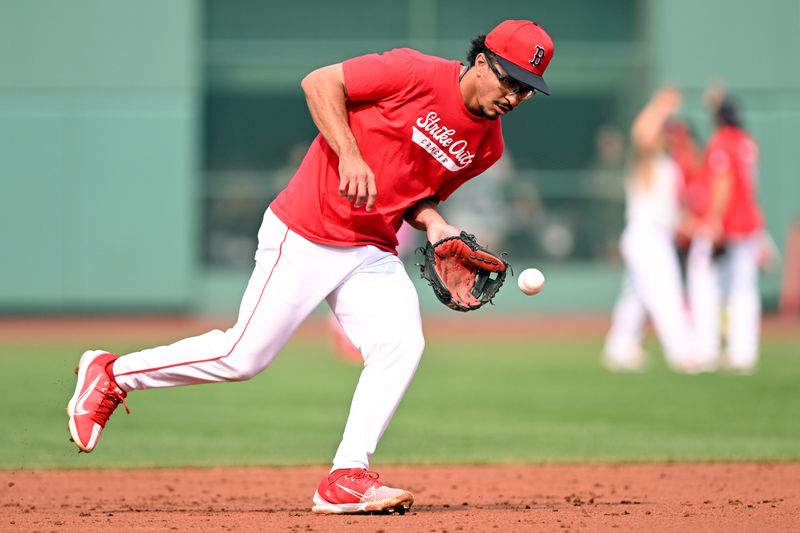 Aug 14, 2024; Boston, Massachusetts, USA; Boston Red Sox shortstop David Hamilton (70) fields the ball before a game against the Texas Rangers at Fenway Park. Mandatory Credit: Brian Fluharty-USA TODAY Sports