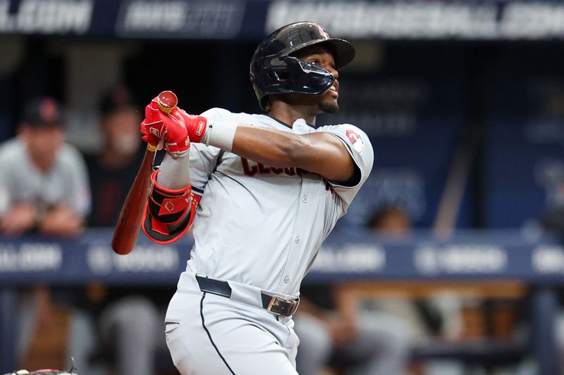 Jul 13, 2024; St. Petersburg, Florida, USA; Cleveland Guardians outfielder Angel Martinez (1) hits a home run against the Tampa Bay Rays in the fifth inning at Tropicana Field. Mandatory Credit: Nathan Ray Seebeck-USA TODAY Sports