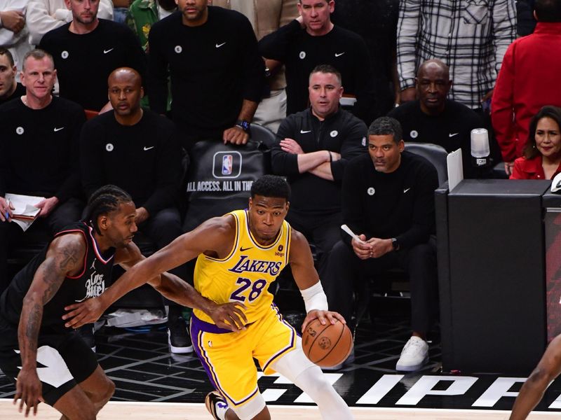 LOS ANGELES, CA - FEBRUARY 28:  Rui Hachimura #28 of the Los Angeles Lakers goes to the basket during the game on February 28, 2024 at Crypto.Com Arena in Los Angeles, California. NOTE TO USER: User expressly acknowledges and agrees that, by downloading and/or using this Photograph, user is consenting to the terms and conditions of the Getty Images License Agreement. Mandatory Copyright Notice: Copyright 2024 NBAE (Photo by Adam Pantozzi/NBAE via Getty Images)