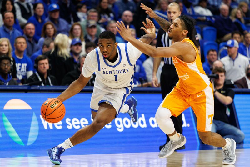 Feb 11, 2025; Lexington, Kentucky, USA; Kentucky Wildcats guard Lamont Butler (1) drives to the basket around Tennessee Volunteers guard Zakai Zeigler (5) during the second half at Rupp Arena at Central Bank Center. Mandatory Credit: Jordan Prather-Imagn Images