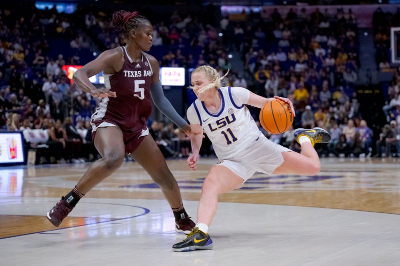 Jan 11, 2024; Baton Rouge, Louisiana, USA; LSU Lady Tigers guard Hailey Van Lith (11) dribbles around Texas A&M Aggies guard Aicha Coulibaly (5) during the second half at Pete Maravich Assembly Center. Mandatory Credit: Matthew Hinton-USA TODAY Sports