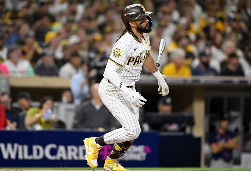 Oct 2, 2024; San Diego, California, USA; San Diego Padres outfielder Fernando Tatis Jr. (23) singles during the fourth inning of game two in the Wildcard round for the 2024 MLB Playoffs against the Atlanta Braves at Petco Park. Mandatory Credit: Denis Poroy-Imagn Images