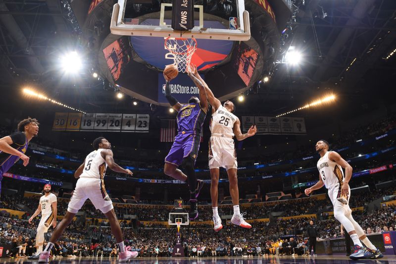 LOS ANGELES, CA - FEBRUARY 9: LeBron James #23 of the Los Angeles Lakers drives to the basket during the game against the New Orleans Pelicans on February 9, 2024 at Crypto.Com Arena in Los Angeles, California. NOTE TO USER: User expressly acknowledges and agrees that, by downloading and/or using this Photograph, user is consenting to the terms and conditions of the Getty Images License Agreement. Mandatory Copyright Notice: Copyright 2024 NBAE (Photo by Andrew D. Bernstein/NBAE via Getty Images)