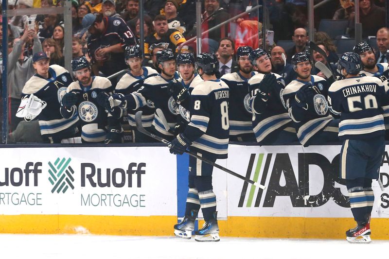 Nov 15, 2024; Columbus, Ohio, USA; Columbus Blue Jackets defenseman Zach Werenski (8) celebrates his goal against the Pittsburgh Penguins during the first period at Nationwide Arena. Mandatory Credit: Russell LaBounty-Imagn Images