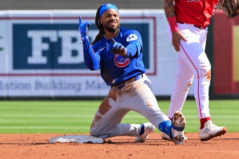 Feb 26, 2026; Tempe, Arizona, USA; Chicago Cubs center fielder Justin Dean (1) reacts after hitting a double in the second inning against the Los Angeles Angels at Tempe Diablo Stadium. Mandatory Credit: Matt Kartozian-Imagn Images