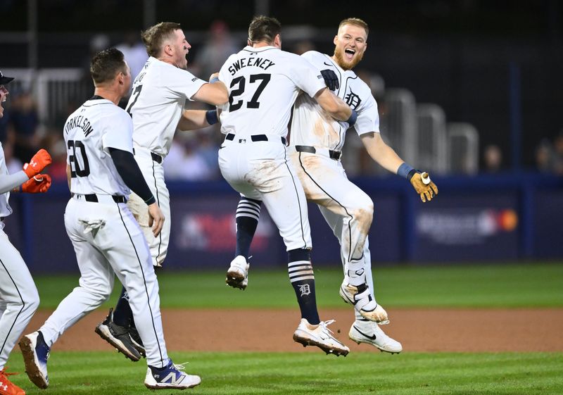 Aug 18, 2024; Williamsport, Pennsylvania, USA; Detroit Tigers outfielder Parker Meadows (22) celebrates with teammates after hitting a walk-off single against the New York Yankees at BB&T Ballpark at Historic Bowman Field. Mandatory Credit: Kyle Ross-USA TODAY Sports