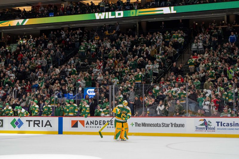 Jan 25, 2025; Saint Paul, Minnesota, USA; After being pulled for the extra skater, Minnesota Wild goaltender Marc-Andre Fleury (29) re-enters the ice as the Minnesota Wild score late in the third period against the Calgary Flames at Xcel Energy Center. Mandatory Credit: Matt Blewett-Imagn Images