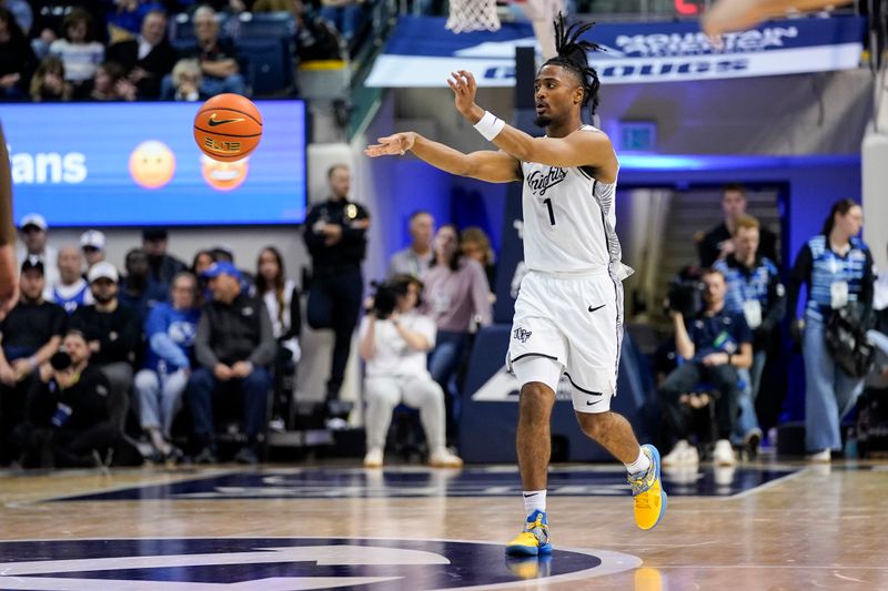 Feb 24, 2026; Provo, Utah, USA; UCF Knights guard Themus Fulks (1) passes the ball during the second half against the BYU Cougars at Marriott Center. Mandatory Credit: Aaron Baker-Imagn Images 