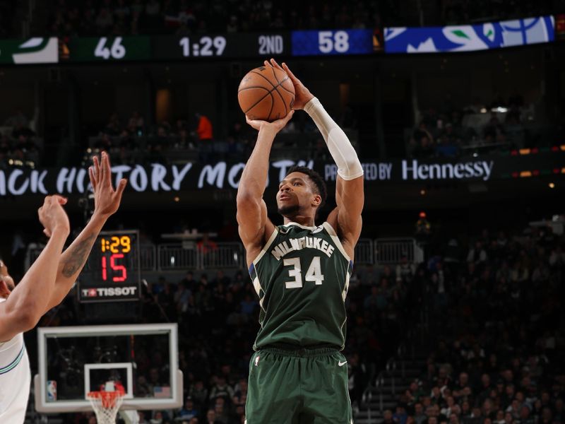 MILWAUKEE, WI - FEBRUARY 8: Giannis Antetokounmpo #34 of the Milwaukee Bucks shoots the ball during the game against the Minnesota Timberwolves on February 8, 2024 at the Fiserv Forum Center in Milwaukee, Wisconsin. NOTE TO USER: User expressly acknowledges and agrees that, by downloading and or using this Photograph, user is consenting to the terms and conditions of the Getty Images License Agreement. Mandatory Copyright Notice: Copyright 2024 NBAE (Photo by Gary Dineen/NBAE via Getty Images).