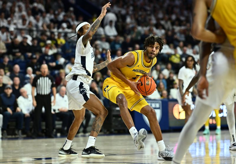 Jan 7, 2024; Philadelphia, Pennsylvania, USA; Michigan Wolverines forward Tray Jackson (2) drives against Penn State Nittany Lions guard Nick Kern Jr (3) in the second half at The Palestra. Mandatory Credit: Kyle Ross-USA TODAY Sports