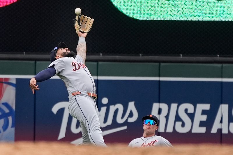 Apr 13, 2025; Minneapolis, Minnesota, USA; Detroit Tigers second baseman Gleyber Torres (25) cannot quite reach a fly ball hit by Minnesota Twins second baseman Willi Castro (not pictured) for a single in the eighth inning at Target Field. Mandatory Credit: Bruce Kluckhohn-Imagn Images