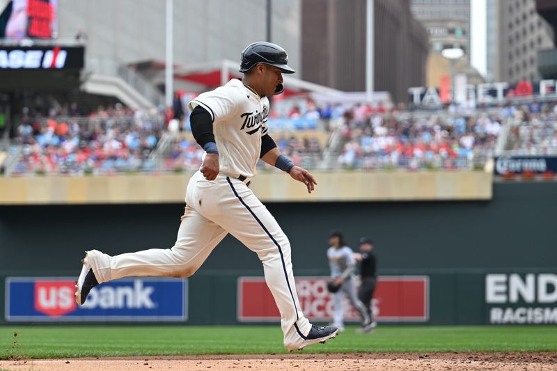 Aug 20, 2023; Minneapolis, Minnesota, USA; Minnesota Twins first baseman Donovan Solano (39) scores a run off a double by second baseman Edouard Julien (not pictured) during the seventh inning at Target Field. Mandatory Credit: Jeffrey Becker-USA TODAY Sports