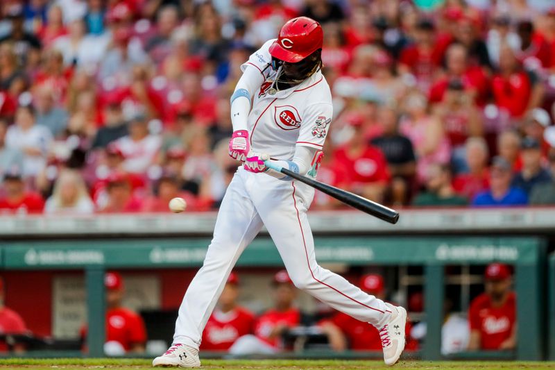 Sep 5, 2023; Cincinnati, Ohio, USA; Cincinnati Reds shortstop Elly De La Cruz (44) hits a single against the Seattle Mariners in the second inning at Great American Ball Park. Mandatory Credit: Katie Stratman-USA TODAY Sports