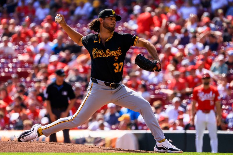 Sep 21, 2024; Cincinnati, Ohio, USA; Pittsburgh Pirates starting pitcher Jared Jones (37) pitches against the Cincinnati Reds in the first inning at Great American Ball Park. Mandatory Credit: Katie Stratman-Imagn Images