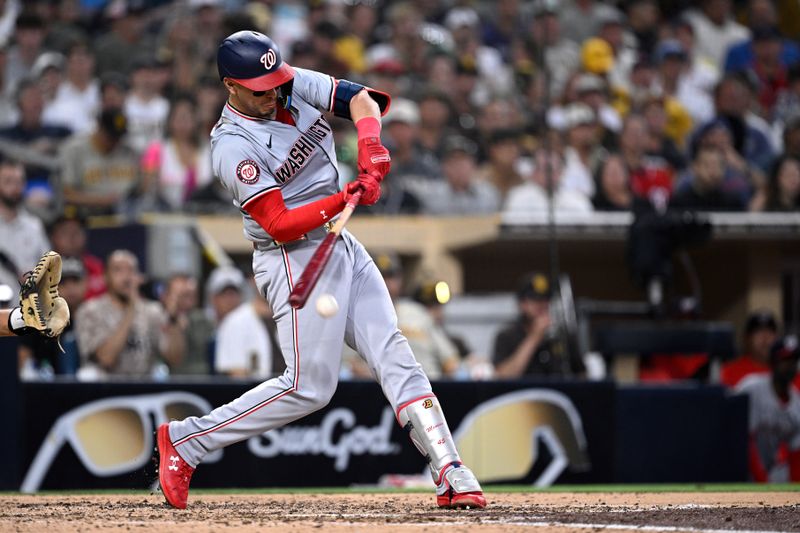 Jun 24, 2024; San Diego, California, USA; Washington Nationals first baseman Joey Meneses (45) hits a single against the San Diego Padres during the fifth inning at Petco Park. Mandatory Credit: Orlando Ramirez-USA TODAY Sports