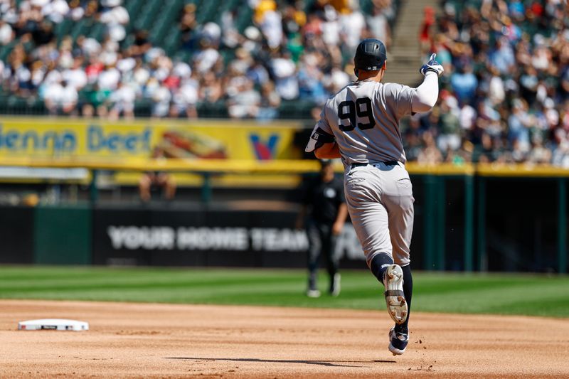 Aug 31, 2025; Chicago, Illinois, USA; New York Yankees designated hitter Aaron Judge (99) rounds the bases after hitting a solo home run against the Chicago White Sox during the first inning at Rate Field. Mandatory Credit: Kamil Krzaczynski-Imagn Images